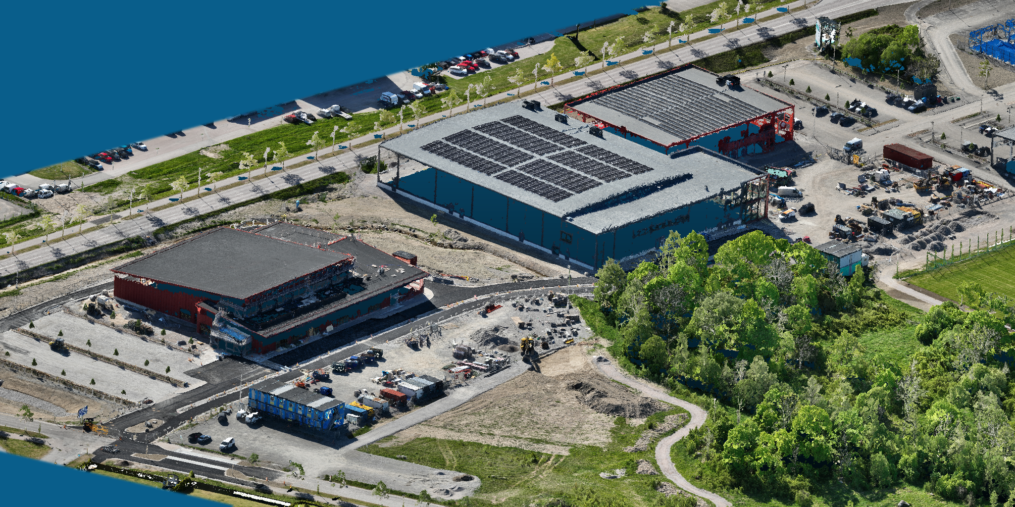 3D-modell över Larslunda IP och byggnationen av badhus och arena Högupplöst 3D-modell över Larslunda IP som visar byggnationen av badhus och arena.